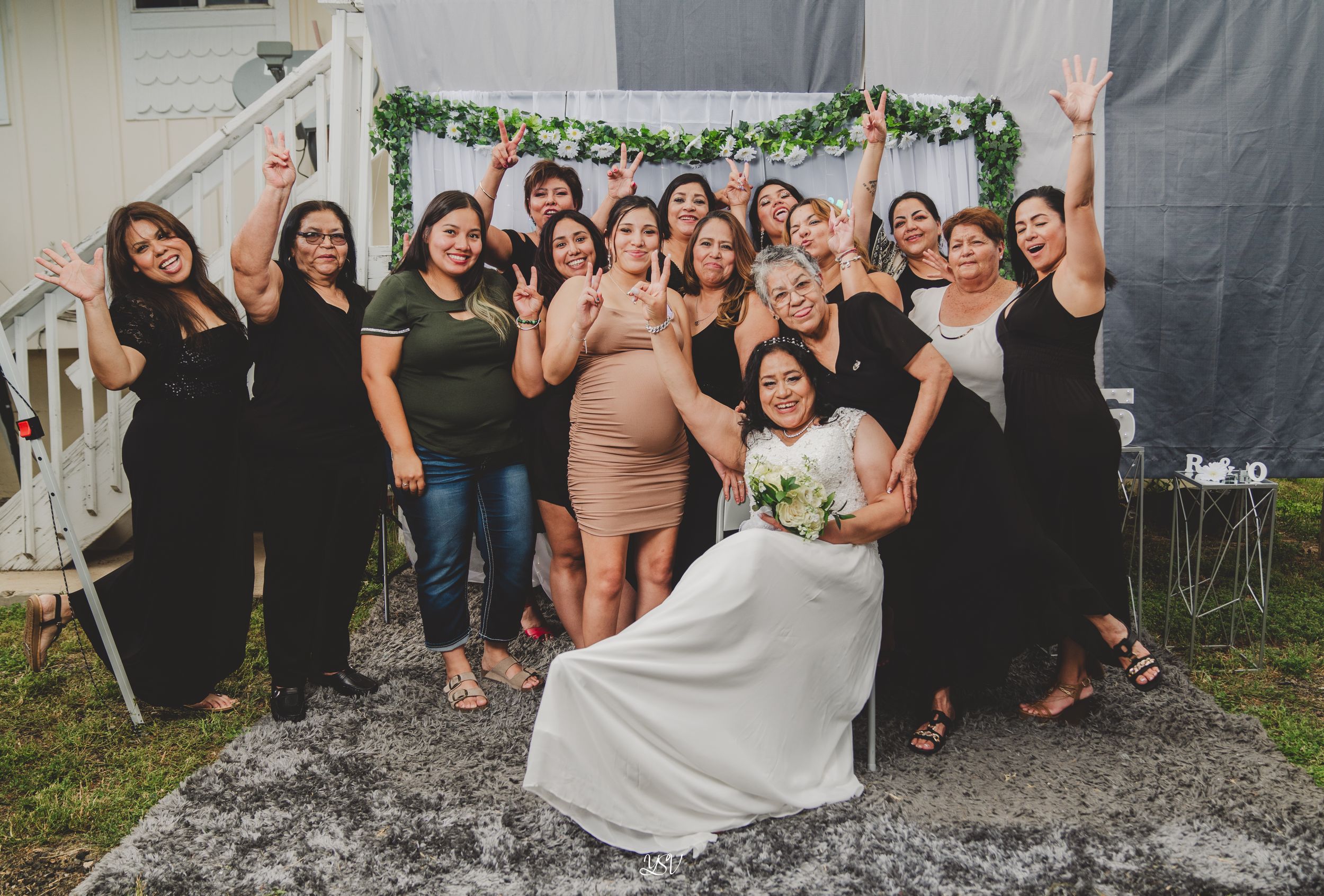 A wedding party poses outdoors in a sequence of joyful jumping photos showing celebration and excitement.