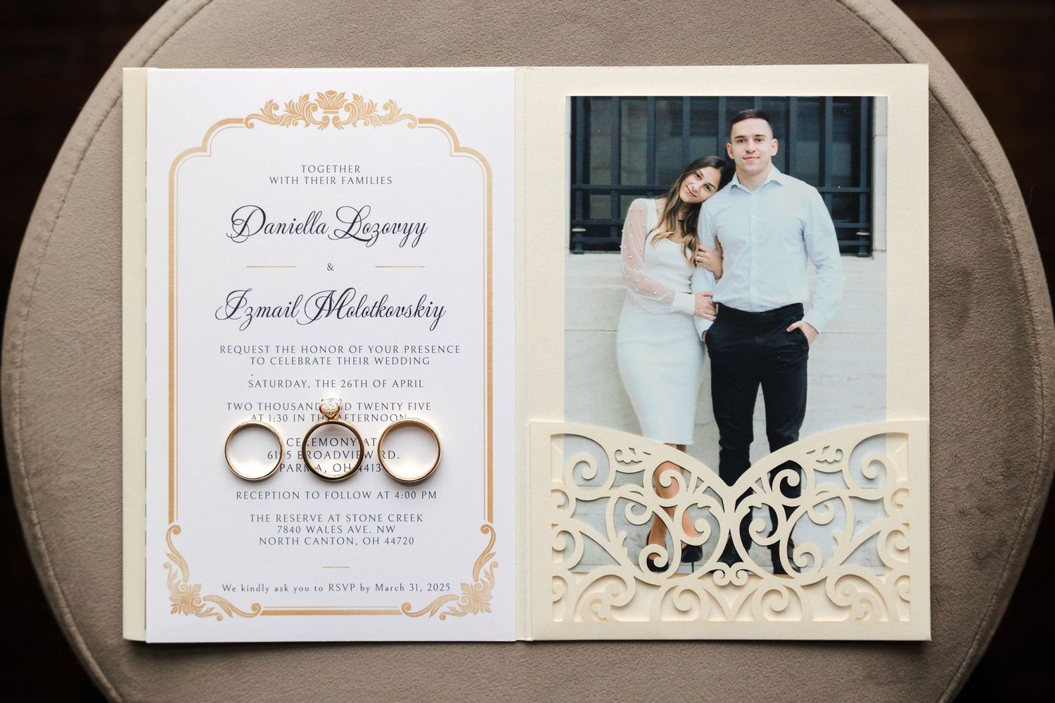 Wedding invitation and rings captured by Tom Forrest Photography from Hudson, Ohio.