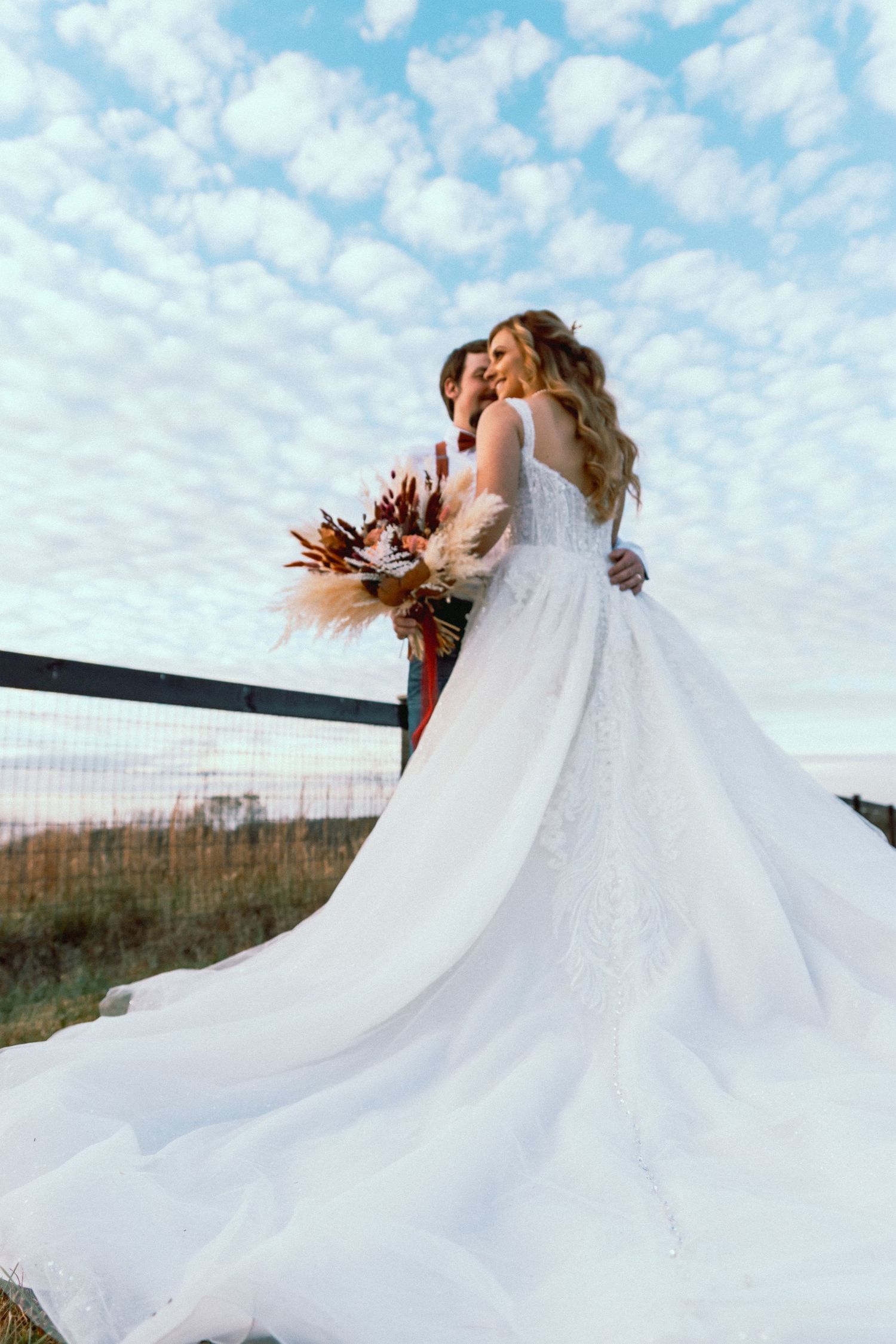 Creative shot of the back of a bride's dress during the couple's session from an assistant photographer in Tennessee