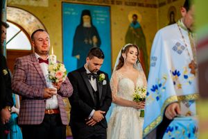 Wedding guests and clergy gathered in a church with yellow and blue decor.