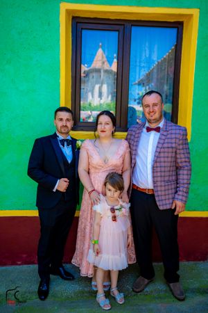 Bright green and yellow building exterior decorated for a special celebration.