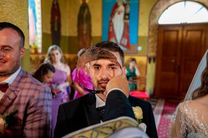 Elegant church interior with guests celebrating during a wedding ceremony.