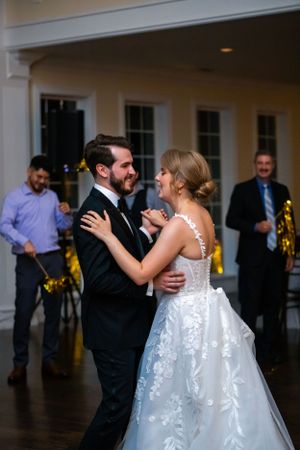 Couple sharing an intimate dance moment at their wedding reception.