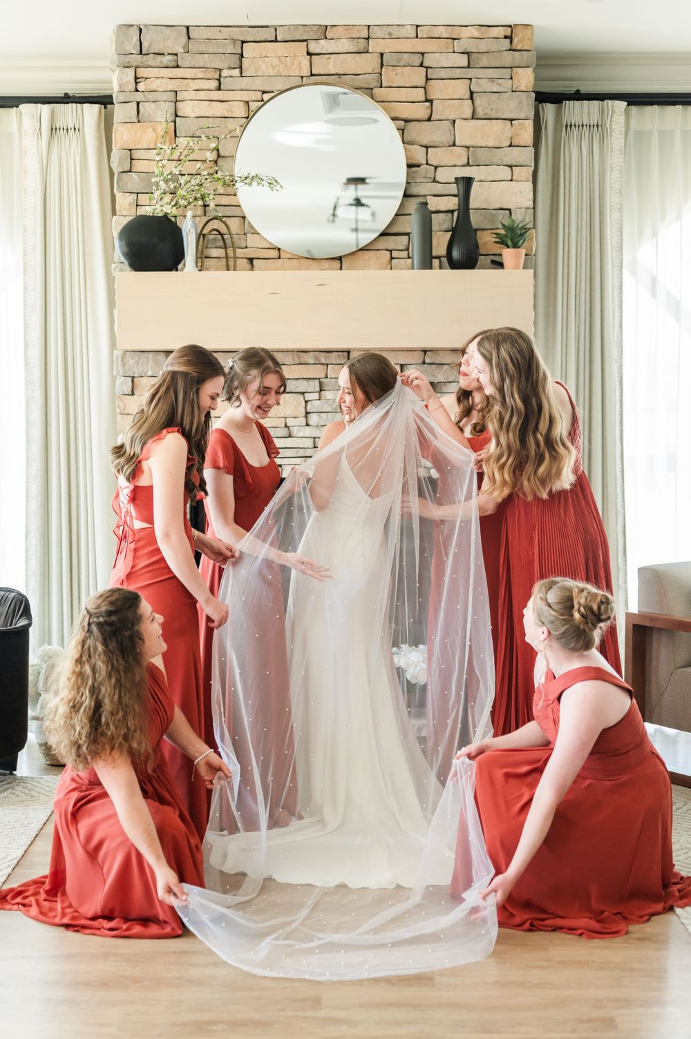 Bride gets ready to get married at her wedding at OSU's St. John Catholic Student Center in Stillwater, Oklahoma.