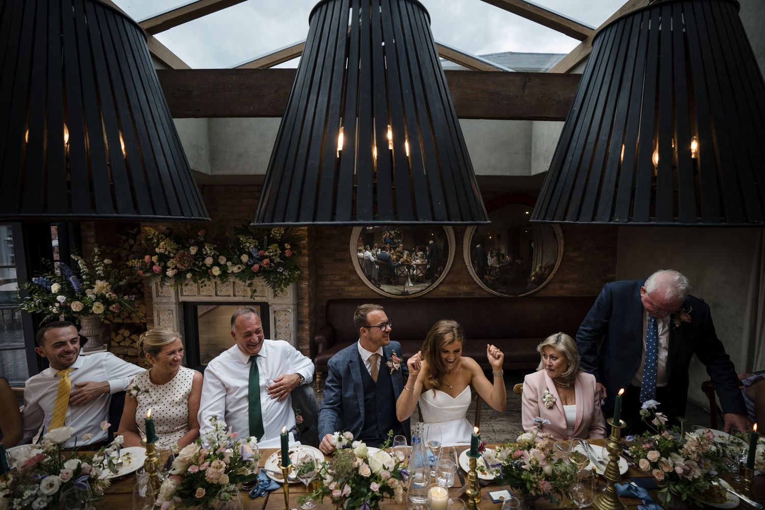 Wedding party laughs together at Wilson Coastal Club, Nova Scotia reception