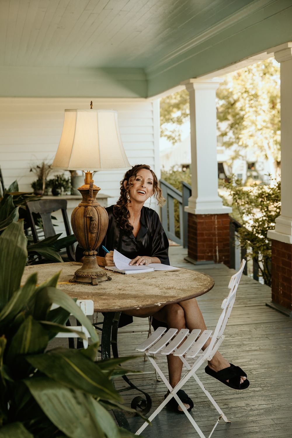 Photograph of family member writing in journal at Wild Daisy Farm in Molena, Georgia.