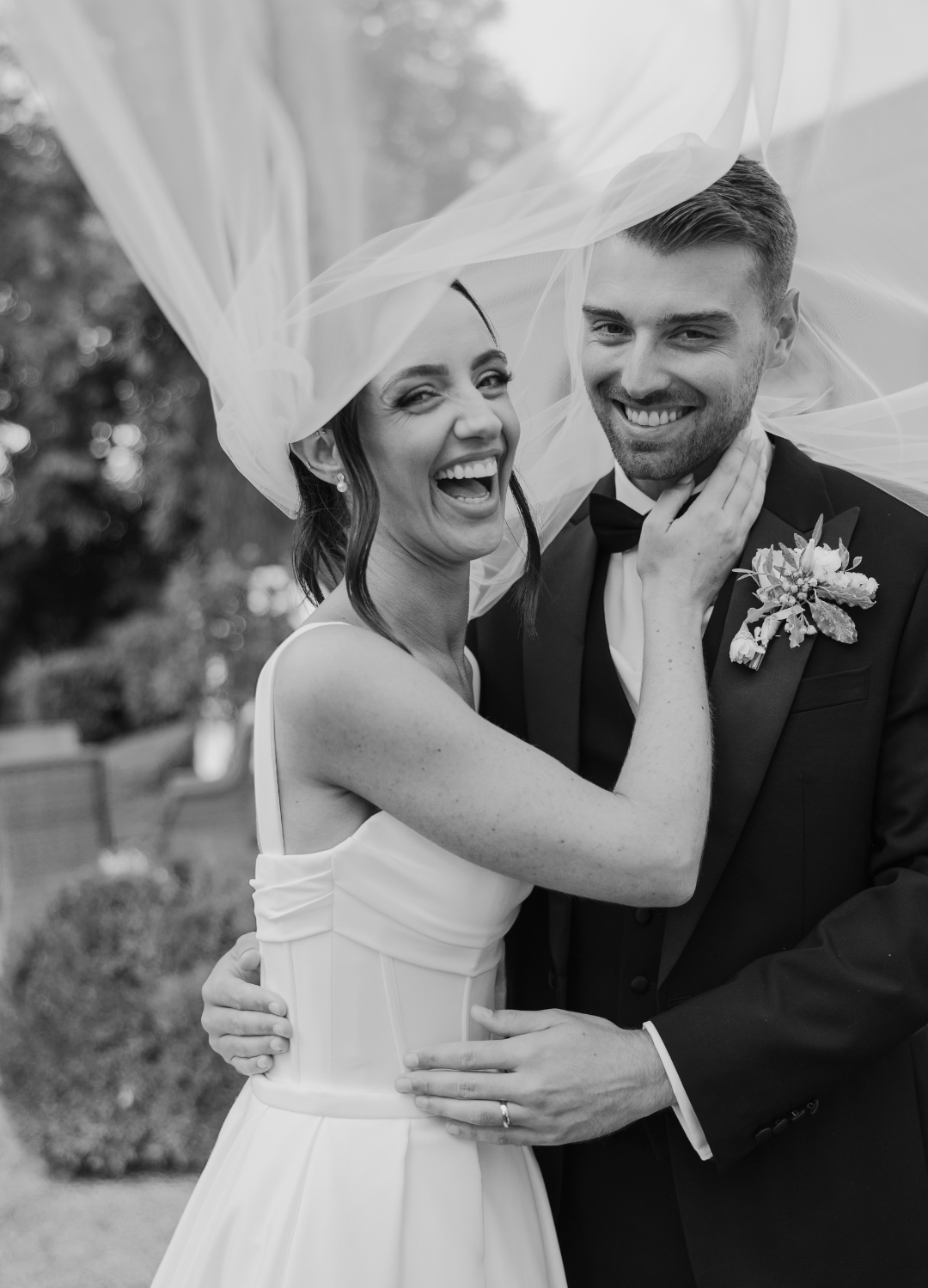 Black and white wedding photo series showing joyful moments between newlyweds embracing and laughing together outdoors.