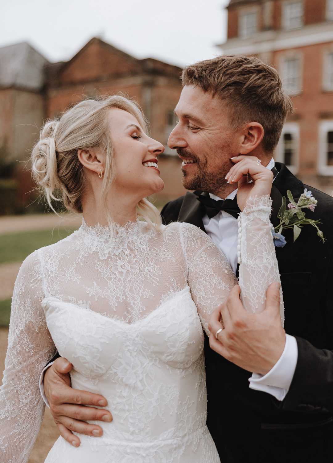 A romantic wedding couple shares intimate moments in a series of candid poses at Crowcombe Court wedding venue