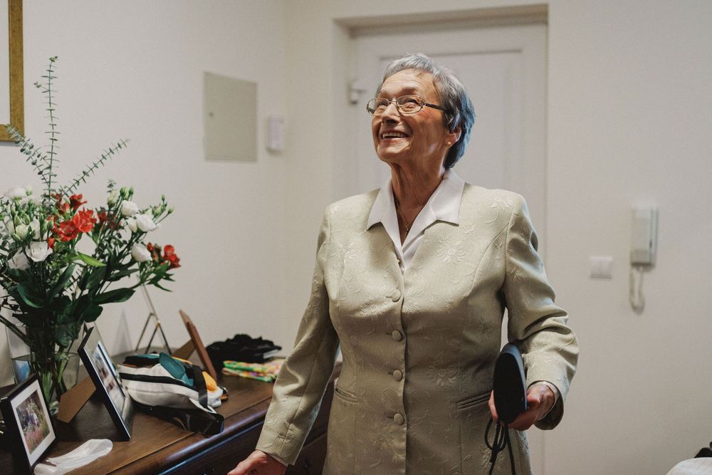 grandmother's first look with the groom during a wedding celebration.