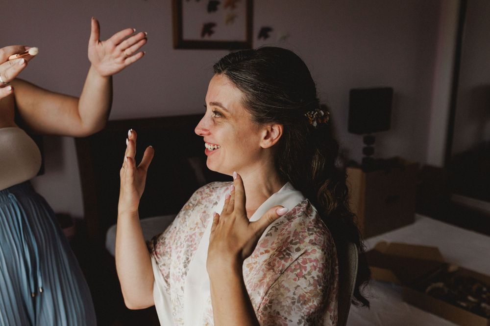 Candid wedding photos showing emotional reactions and joyful moments during a celebration.
