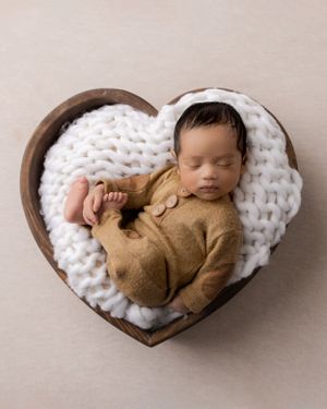 Newborn baby photographer east cork photography baby in heart bowl