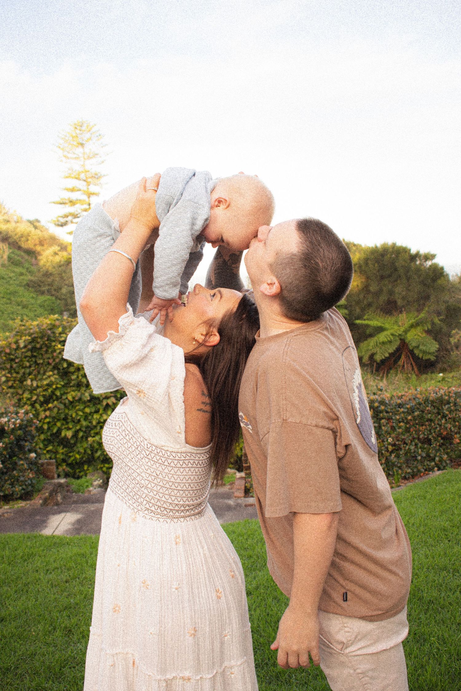 Newcastle family photographer capturing a family laughing at King Edward Park