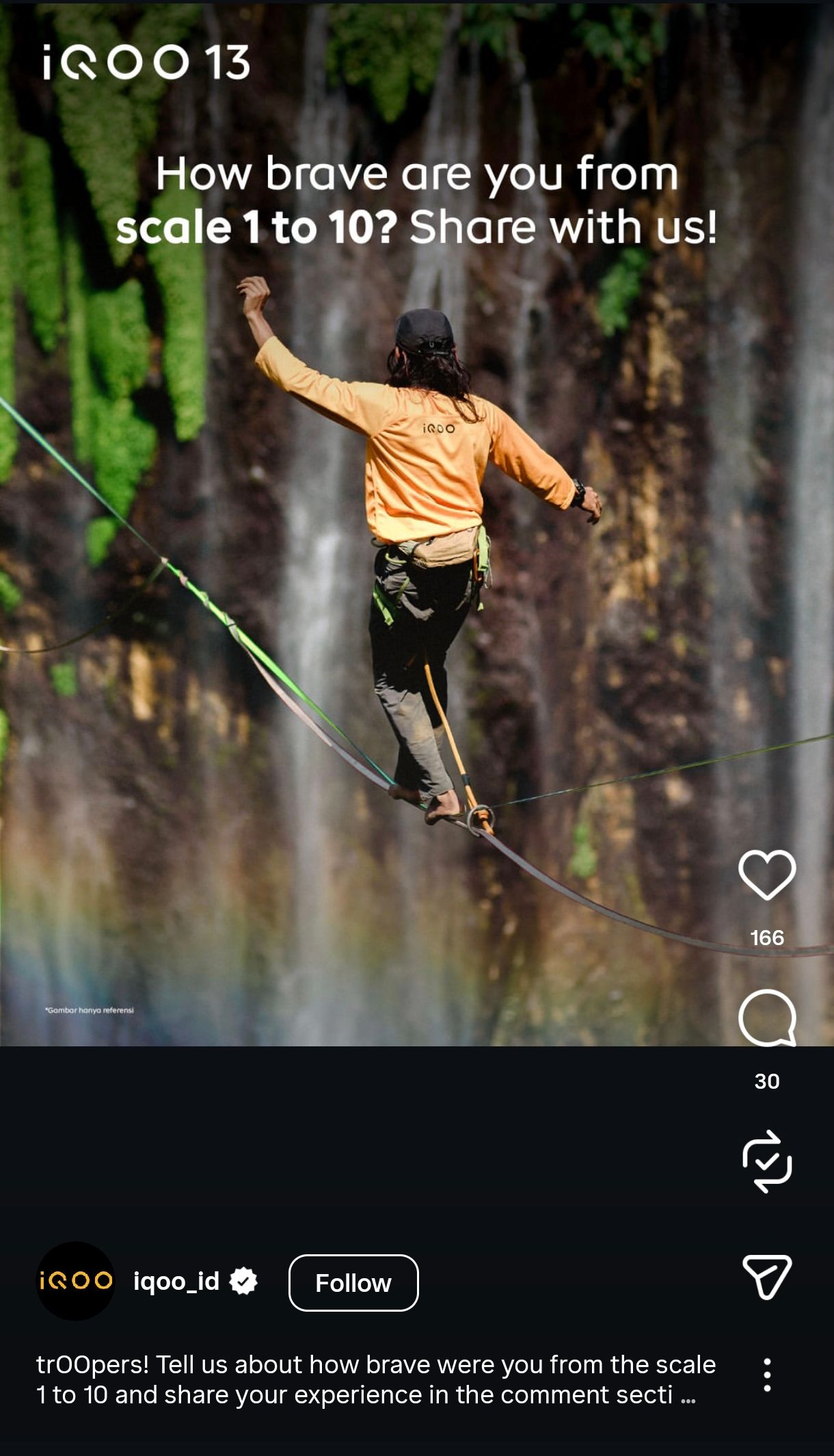 Person in yellow shirt performs skateboarding trick on ramp with forest backdrop in iQOO social media post.