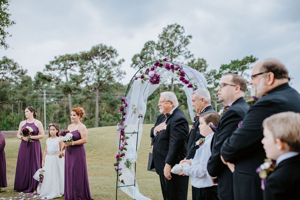 A series of outdoor wedding photos showing guests and bridal party members in purple dresses against a natural backdrop.
