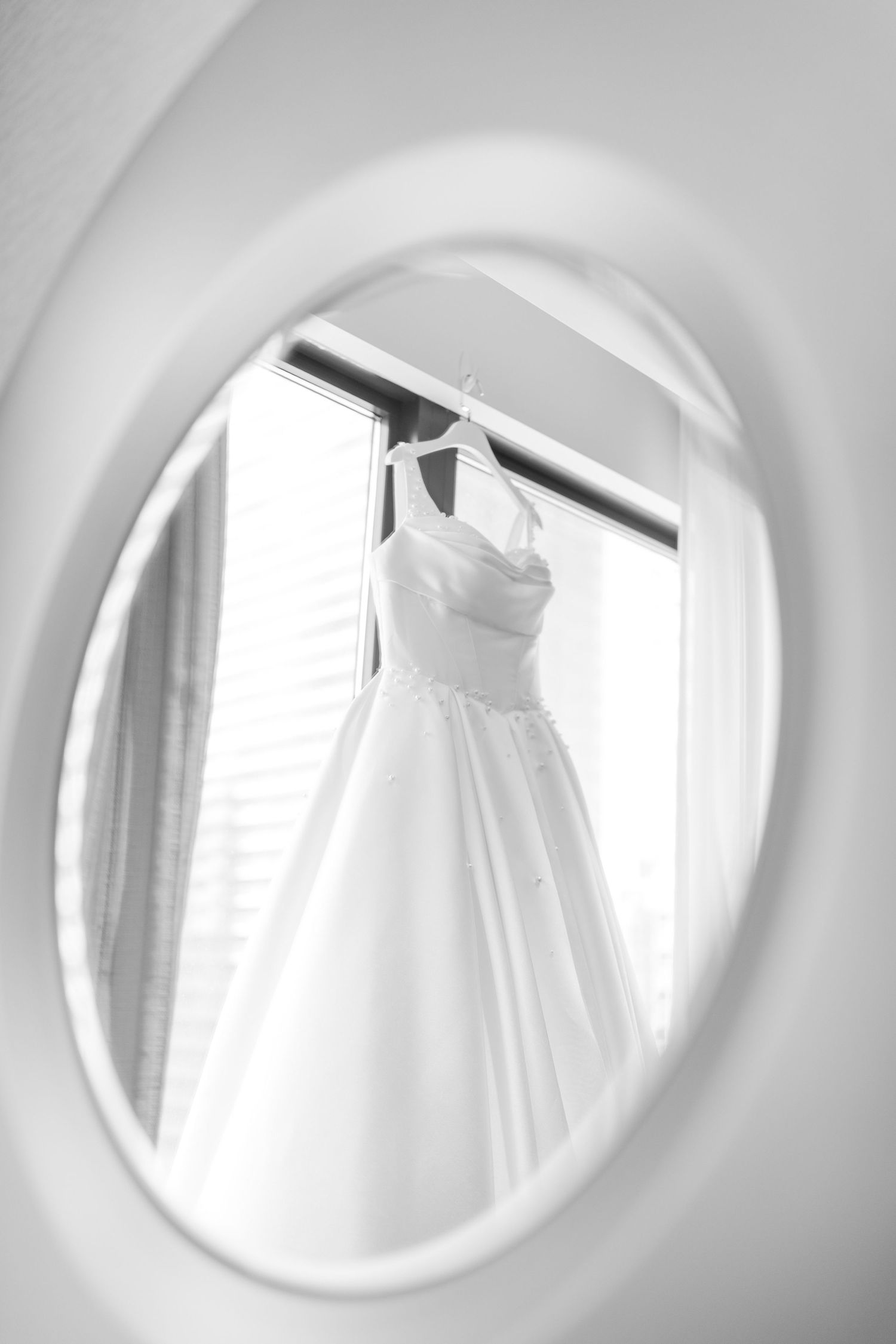 Elegant bridal boudoir photo series showing delicate poses against soft white background.