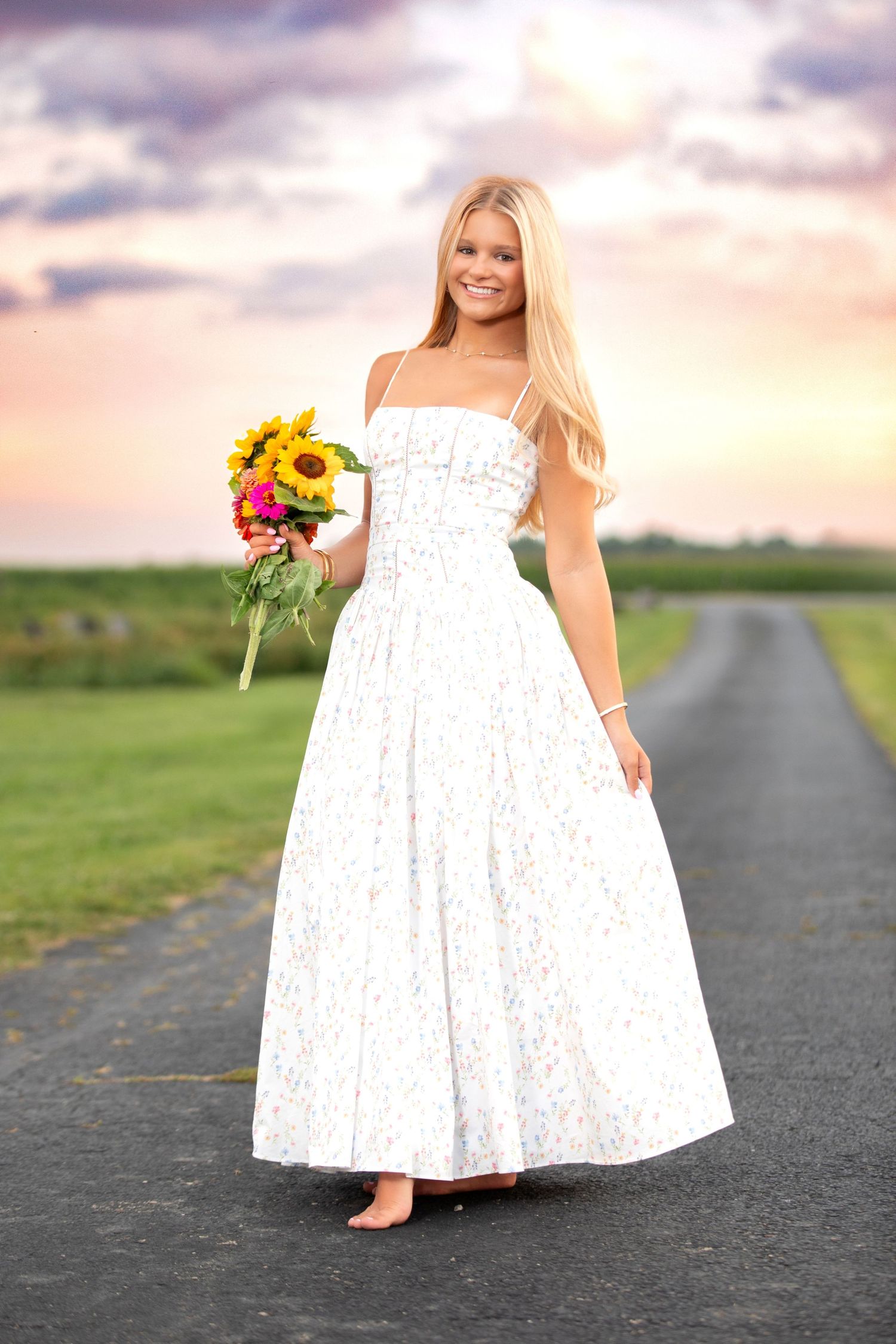 Olentangy Berlin senior pictures.  Senior pics in a meadow.  Floral senior pictures. Senior pictures in a field. Downtown London senior pics