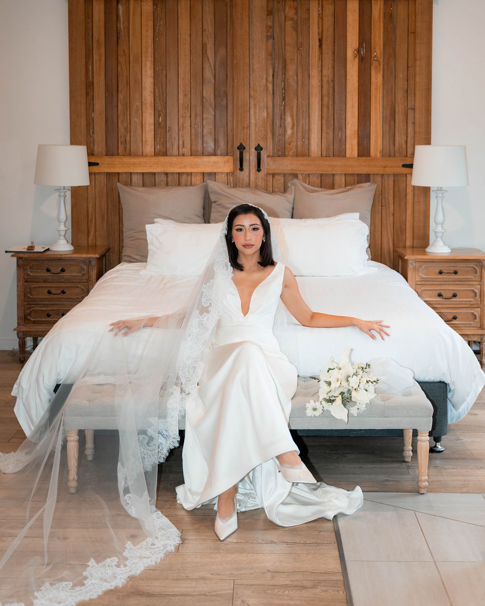 A series of wedding photos showing the bottom half of a bride in a white dress and veil sitting on a wooden bench.