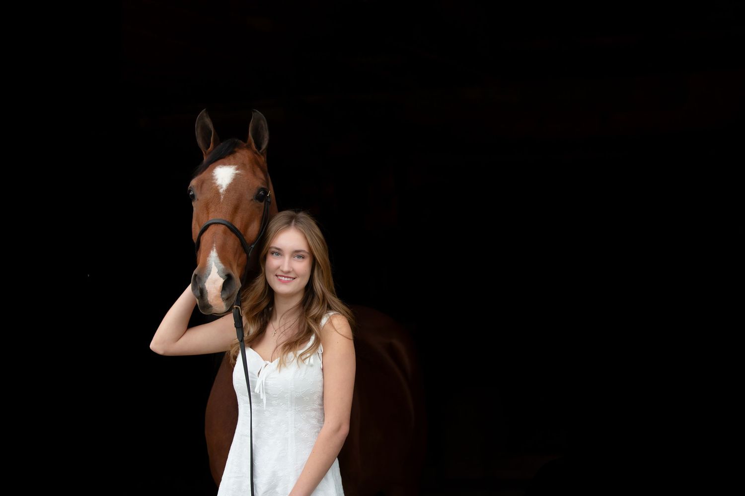 High school senior girl with horse; equine senior photos in Fenton, MI.  Pet portraits by Brighton, Michigan photographer