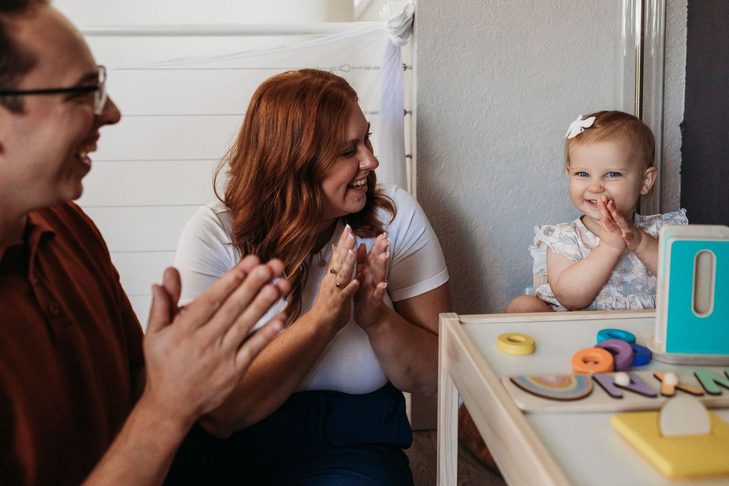 A collection of six connected photos showing family interactions and daily moments around a kitchen table.