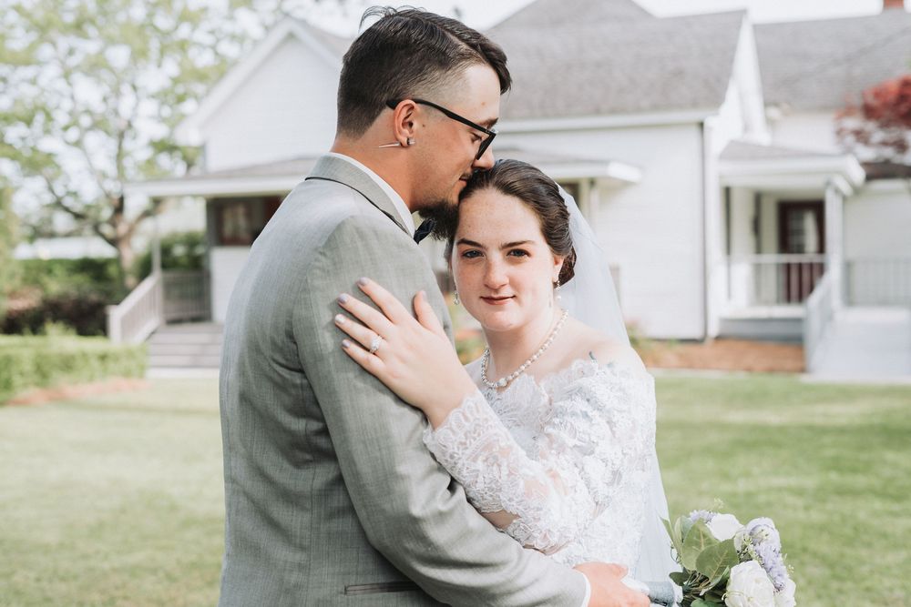 Portrait of groom and bride after the wedding ceremony; Small wedding photographer, Middle GA