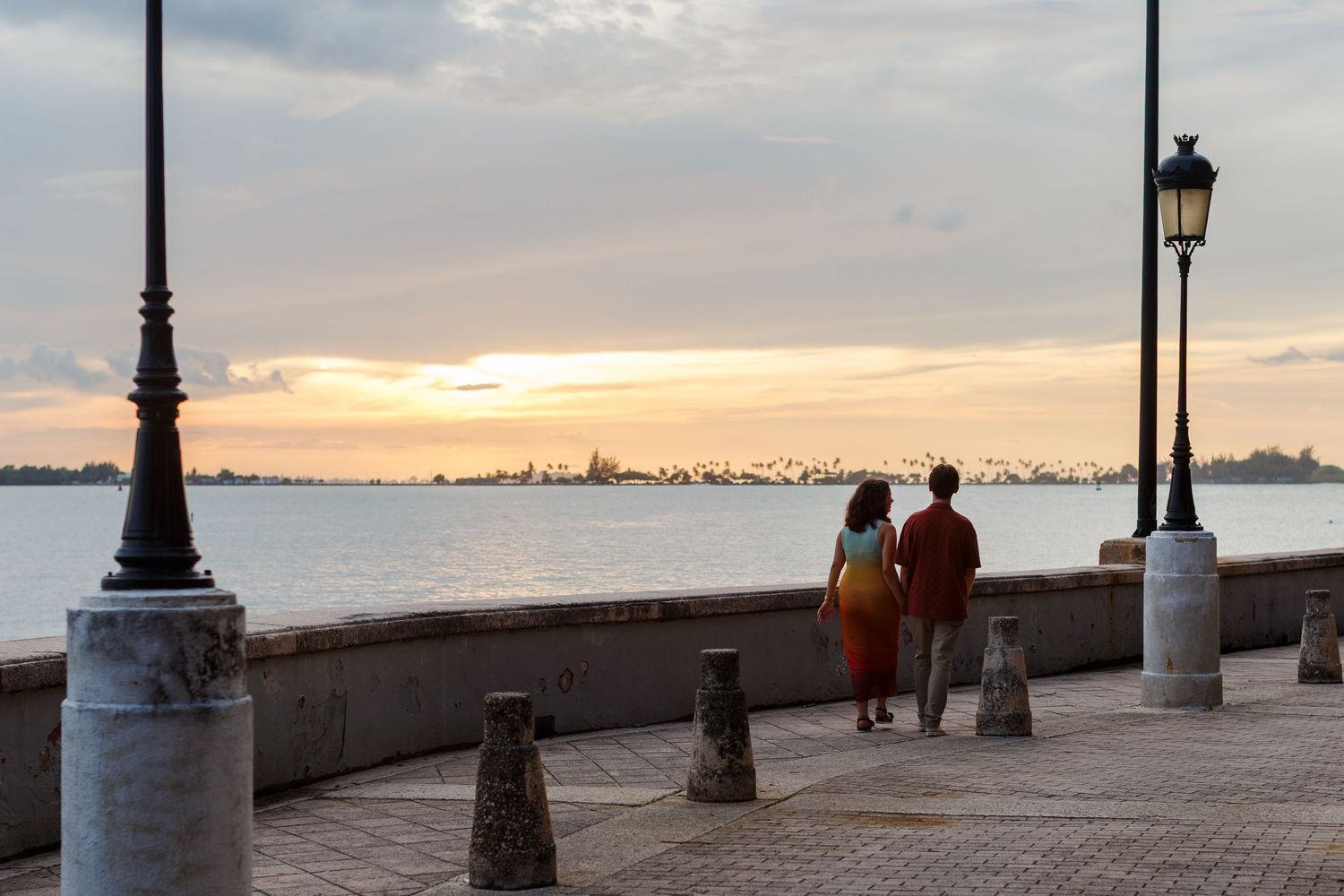 Surprise marriage proposal in Old San Juan, Puerto Rico. Paseo de la Princesa. Man and woman.