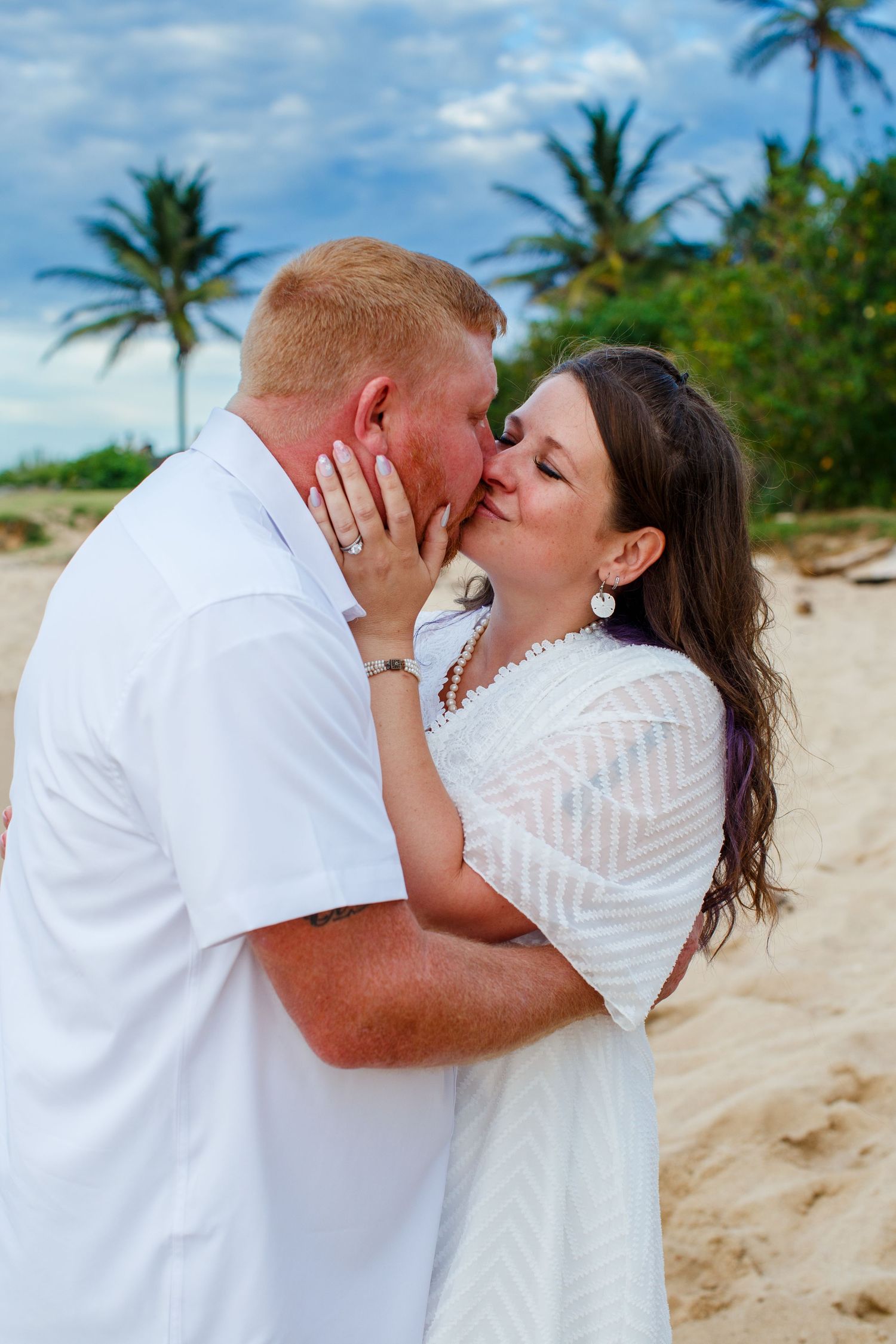Elopement on the beach at Balneario del Escambrón in Old San Juan, Puerto Rico. Couples portrait - bride and groom.