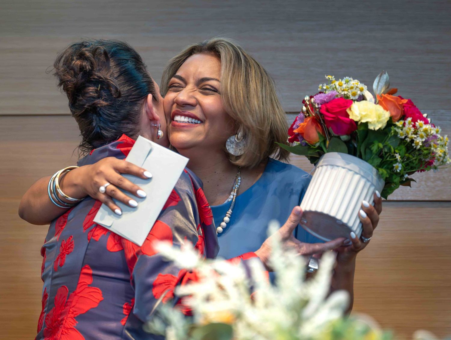 An event photo showing warmth and connection can be used to highlight company culture all year long,
