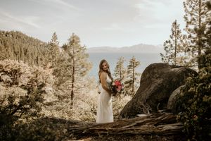 Mountain wedding photography series showing an idyllic forest ceremony with bride silhouettes at sunset in California.