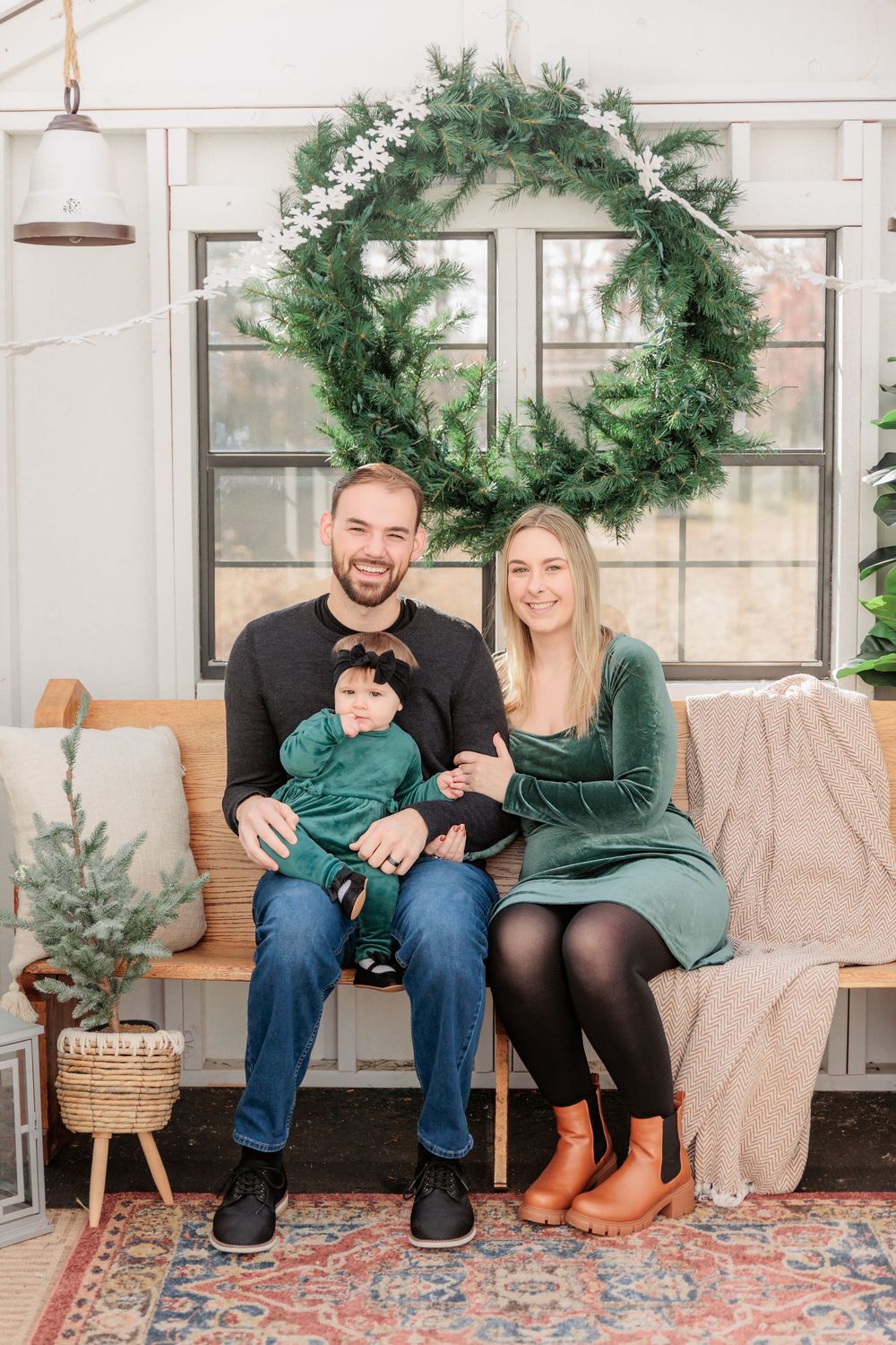 Three sequential winter photos show a couple on a porch with warm knit blankets and evergreen holiday decor. Turkey Trac Farm Millville NJ