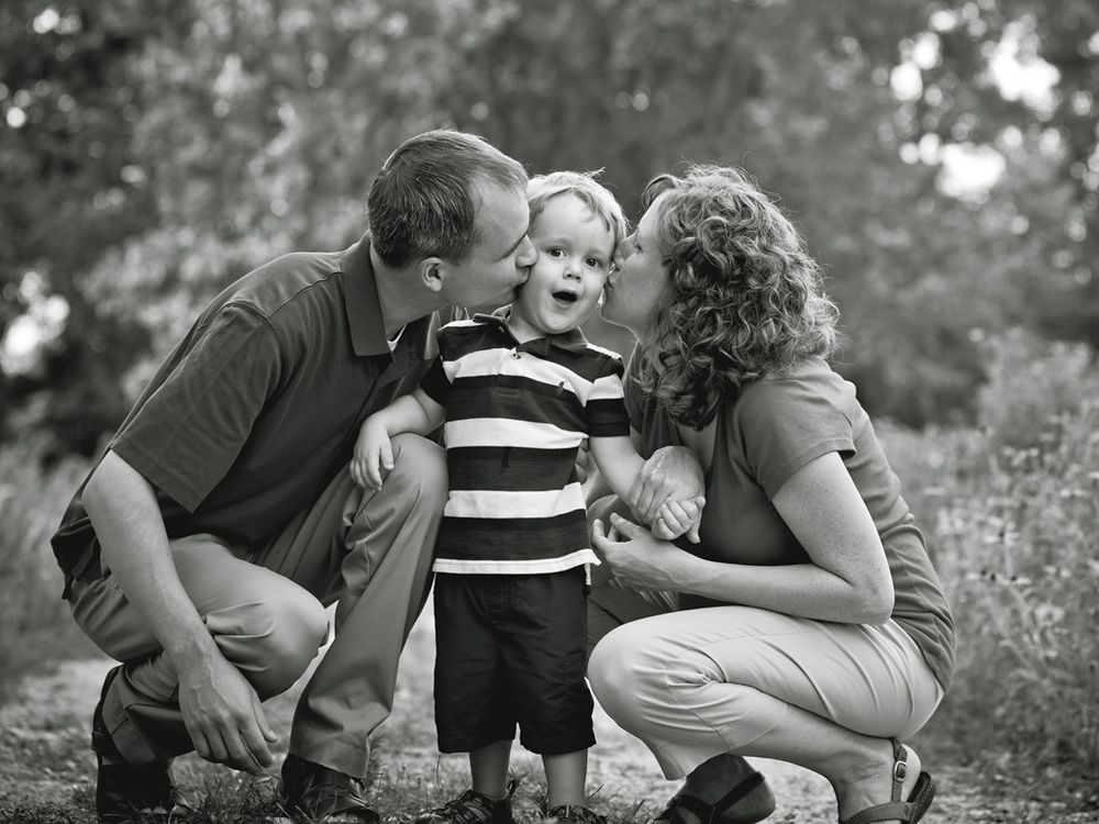 Family and child at park; portrait photography session in Ann Arbor, Michigan.