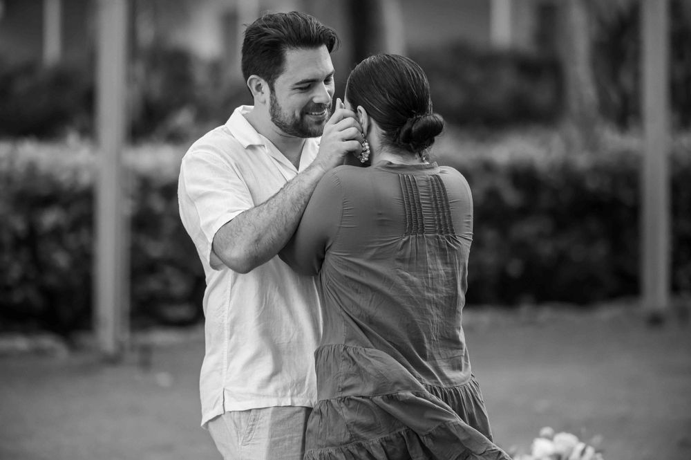 A tender black and white moment between a couple during their engagement.
