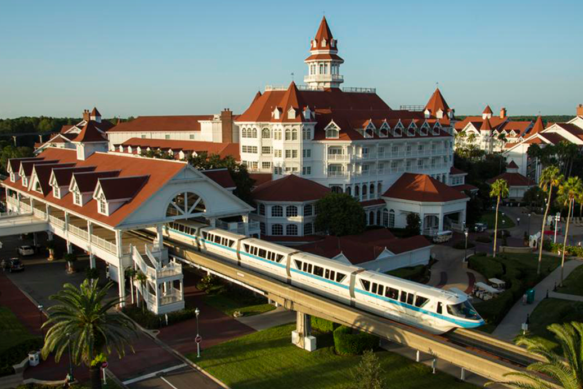 Aerial view of Grand Floridian Resort showing Victorian architecture and monorail track.