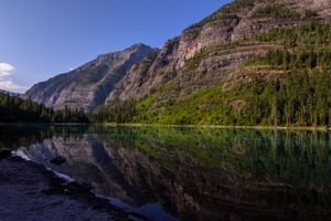 Glacier National Park mountain scene that is reflected in the Avalanche Lake