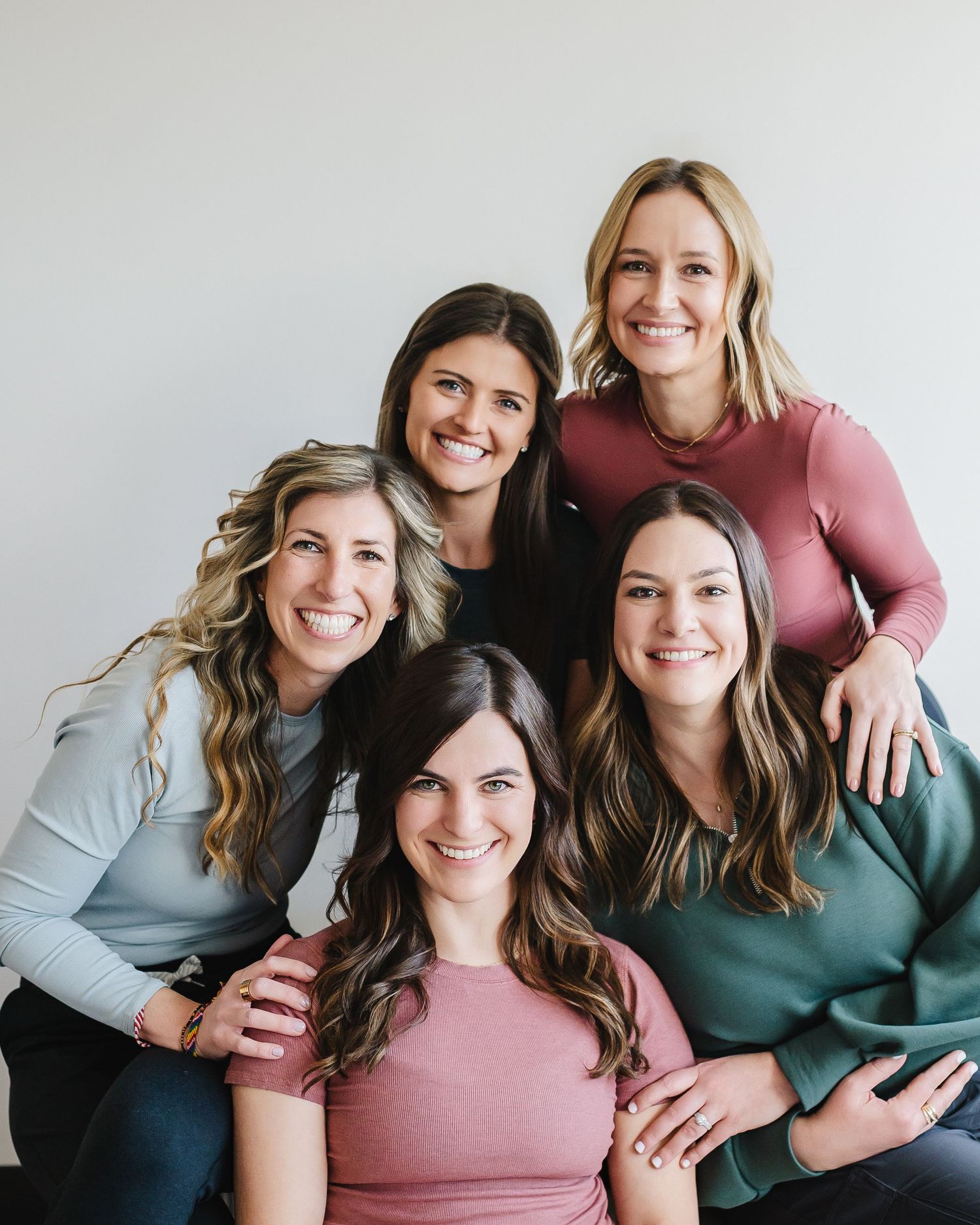 business team photo shoot for progress through play physical therapy office in Denver Colorado