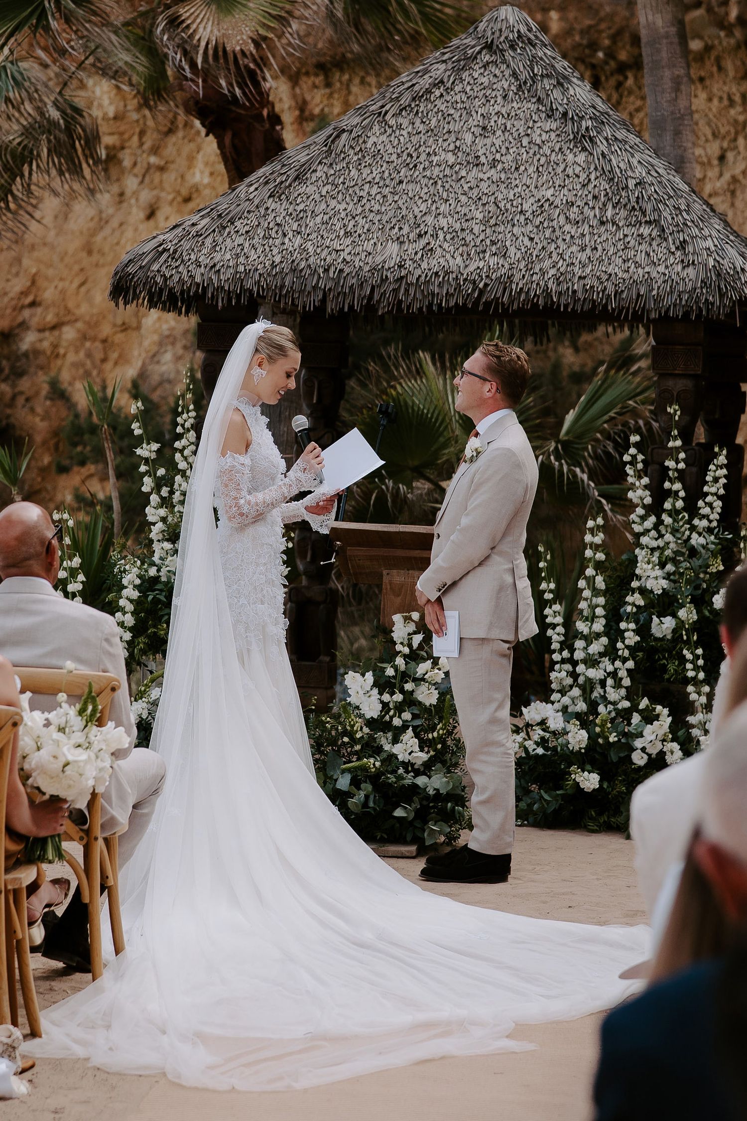 bride reading her vows to groom during ceremony at amante ibiza