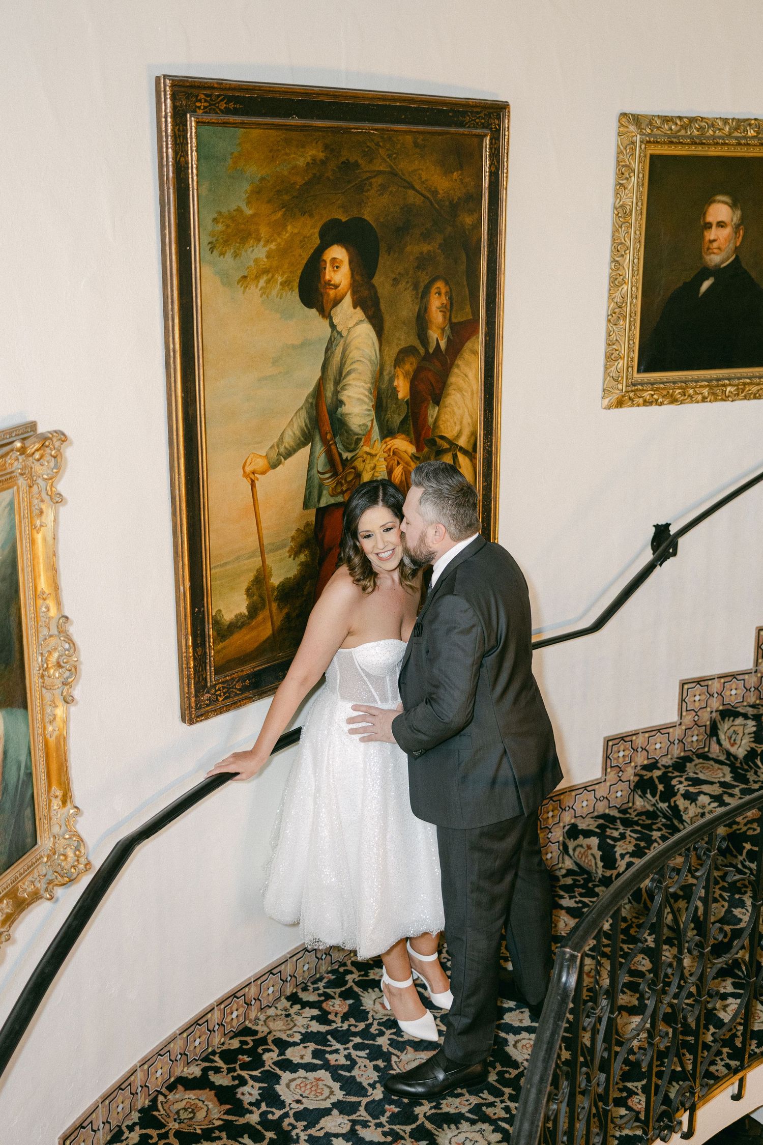 Couple posed on staircase
