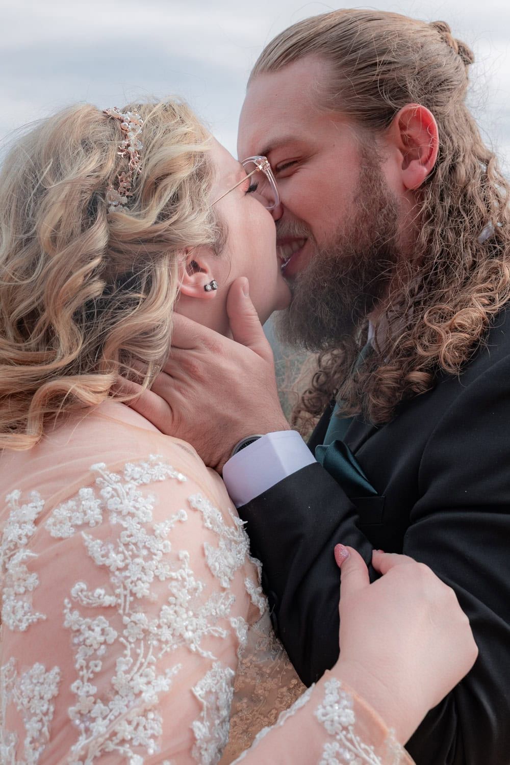 A romantic wedding moment captured with lace dress details and intimate poses.
