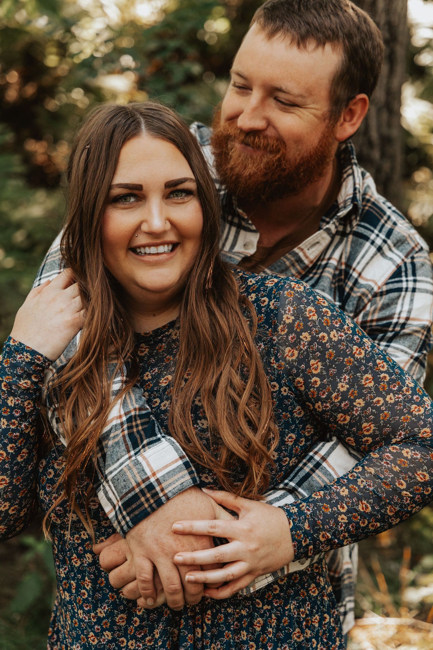 A couple shares intimate moments outdoors in a series of candid shots showing laughter and embraces.