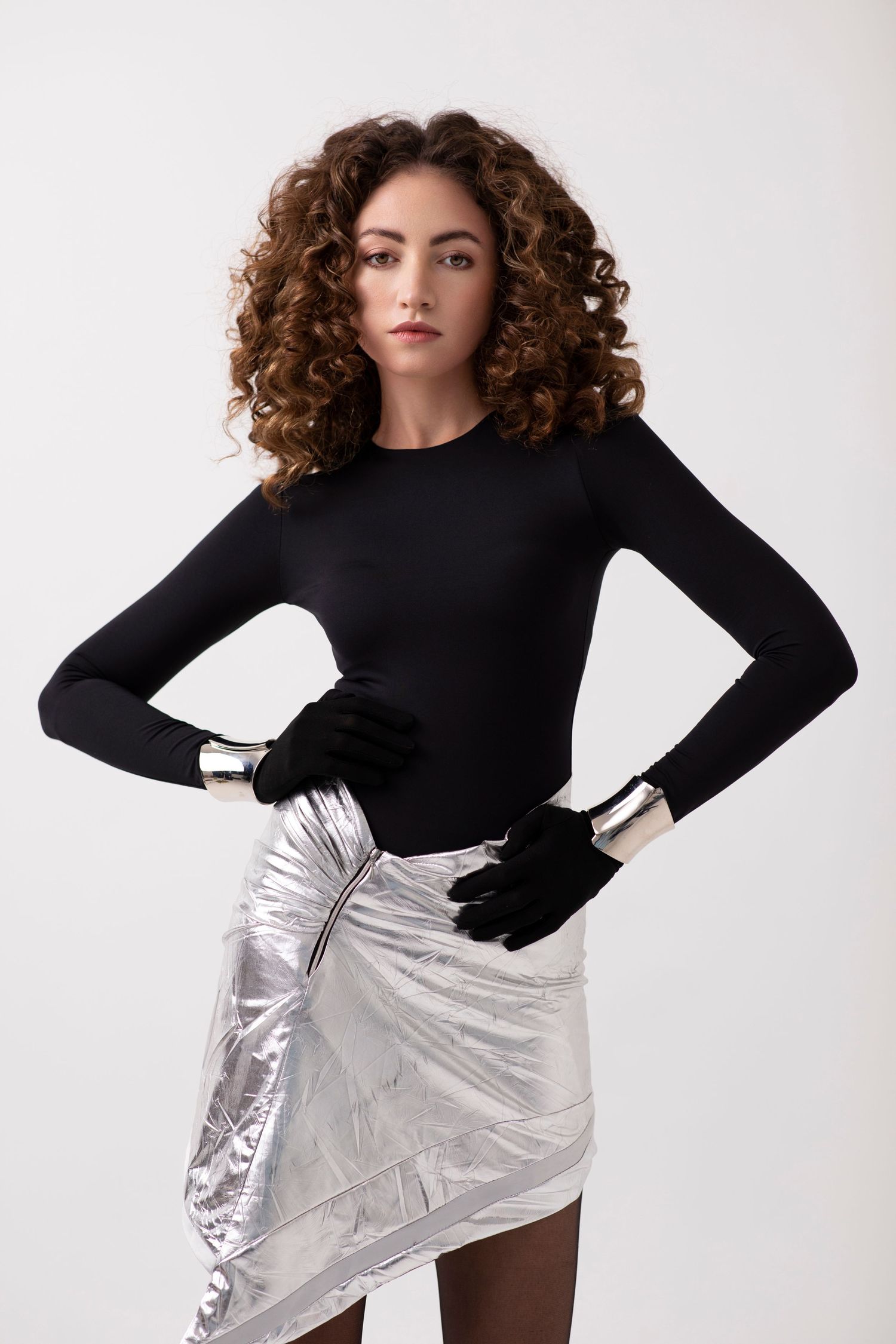 Futuristic style for a fashion shoot in London. Models own bouncy curls and sultry look makeup