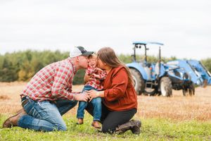 A series of candid moments in a field showing people taking photos of something close to the ground.