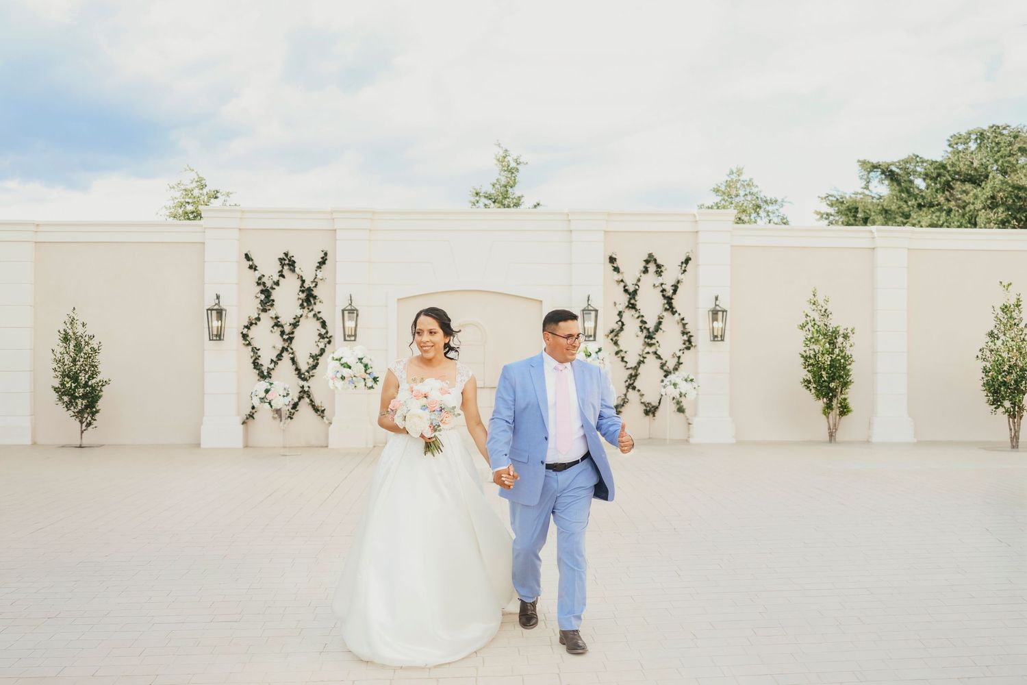 Wedding ceremony recessional with joyful newlyweds walking down aisle