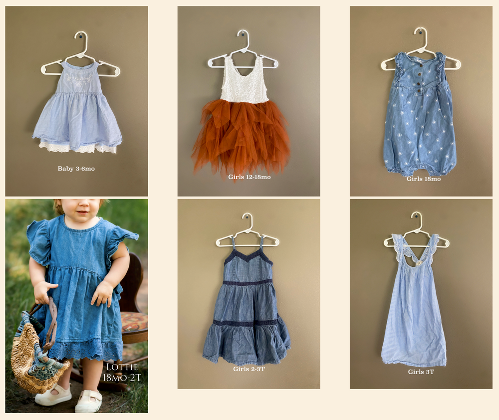 Collection of children's dresses featuring blue floral prints, tiered ruffles, and orange tulle designs on hangers.