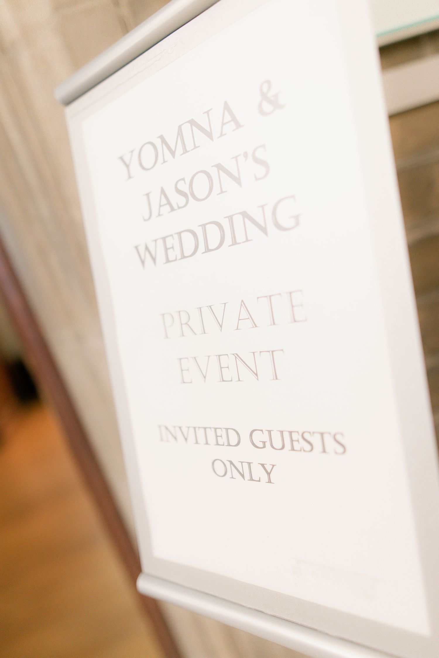 A wedding sign indicating a private event for invited guests only.