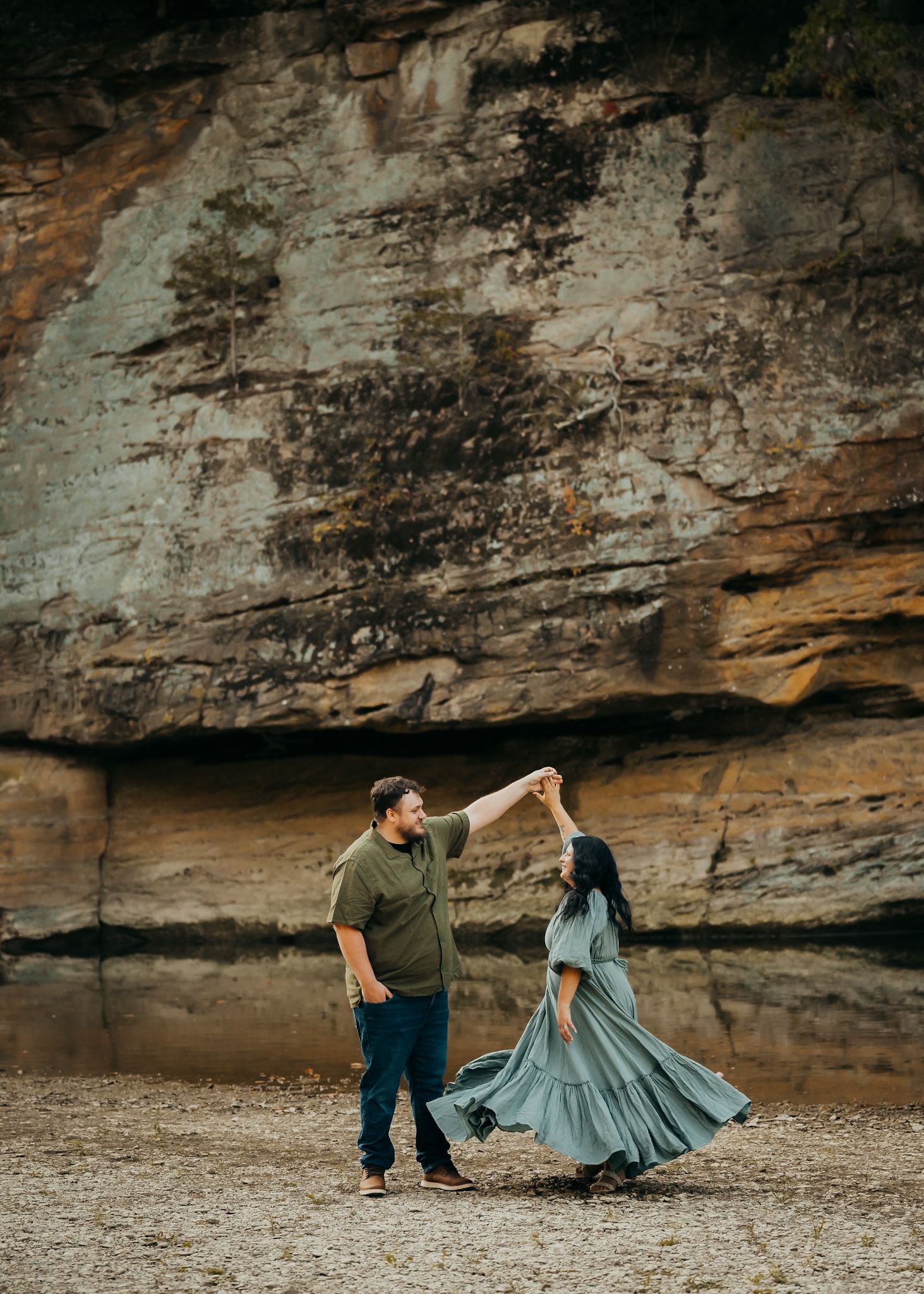 Couple dancing in creek bed at Turkey Run State Park with a Portrait Photographer.