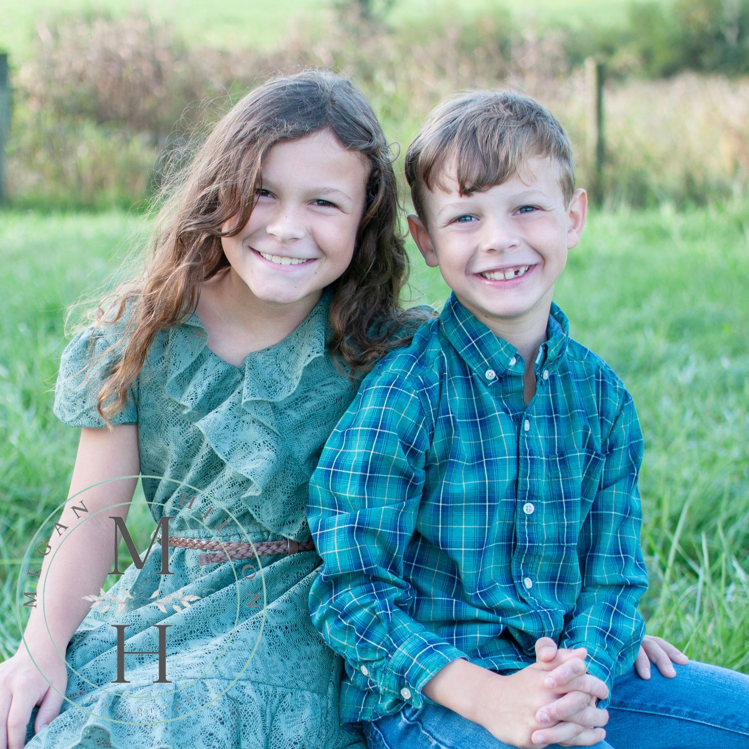 Siblings sitting posed fall photos