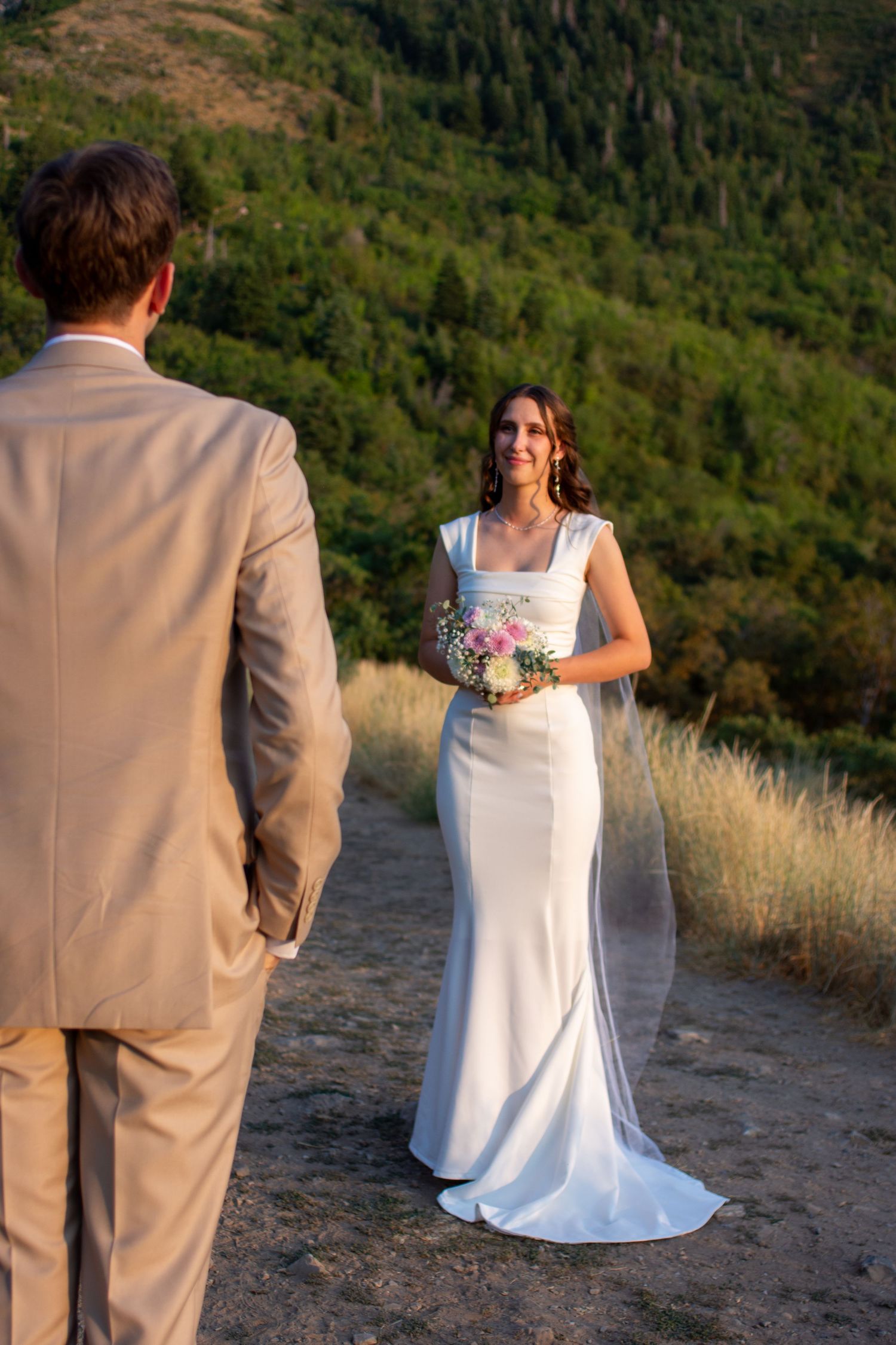 groom looking at bride. Utah wedding. Utah Landscape