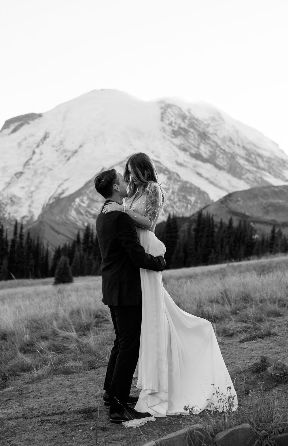 Black and white photograph of dramatic elopement in Washington State Park, shot by Wedding photographer