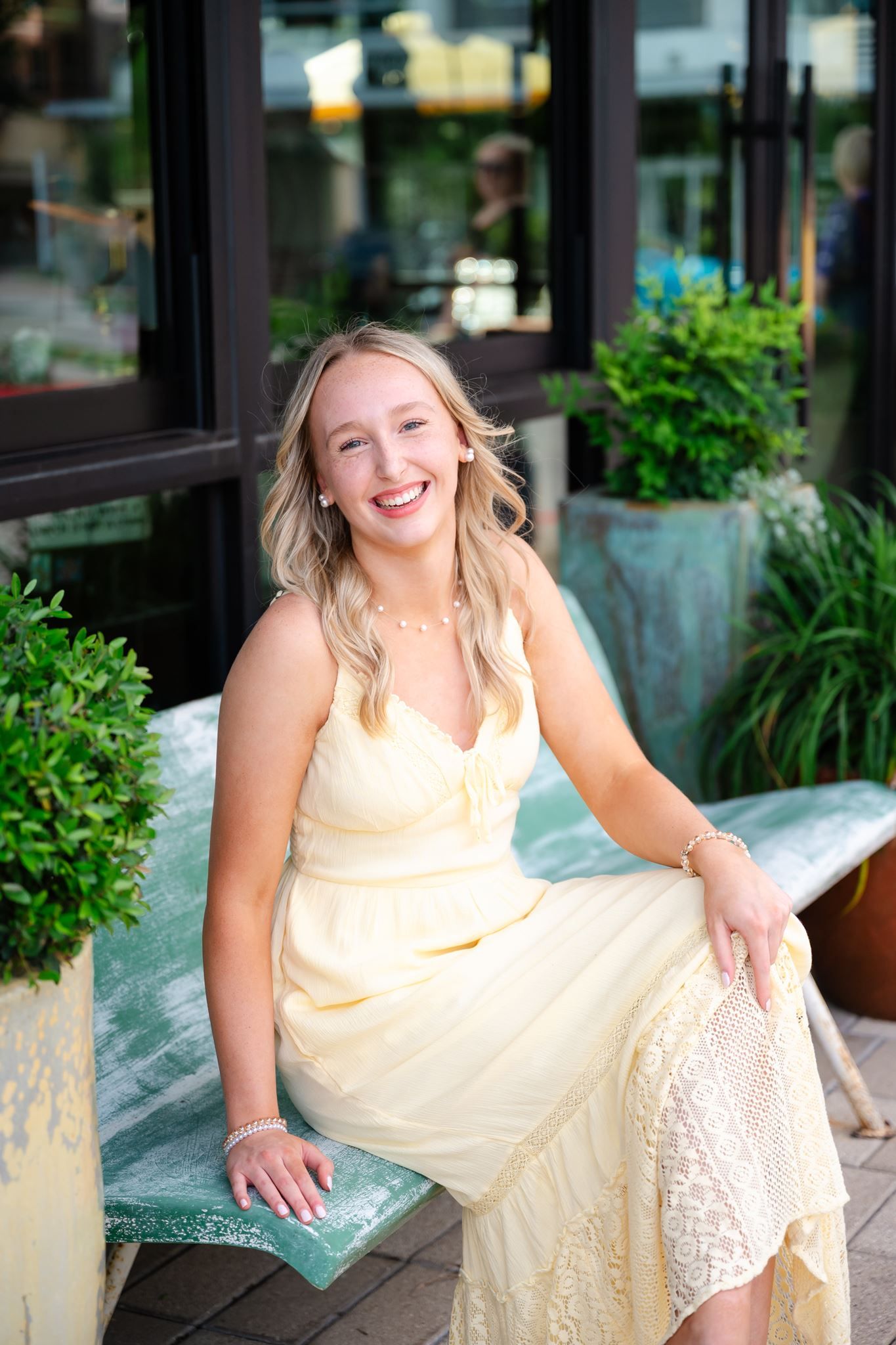 Senior girl posing at Hughes Landing in The Woodlands Texas