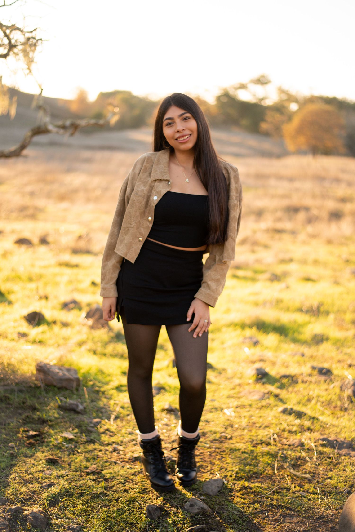 Natural senior portraits in Sonoma County with golden fields, dreamy light, and a timeless editorial feel.