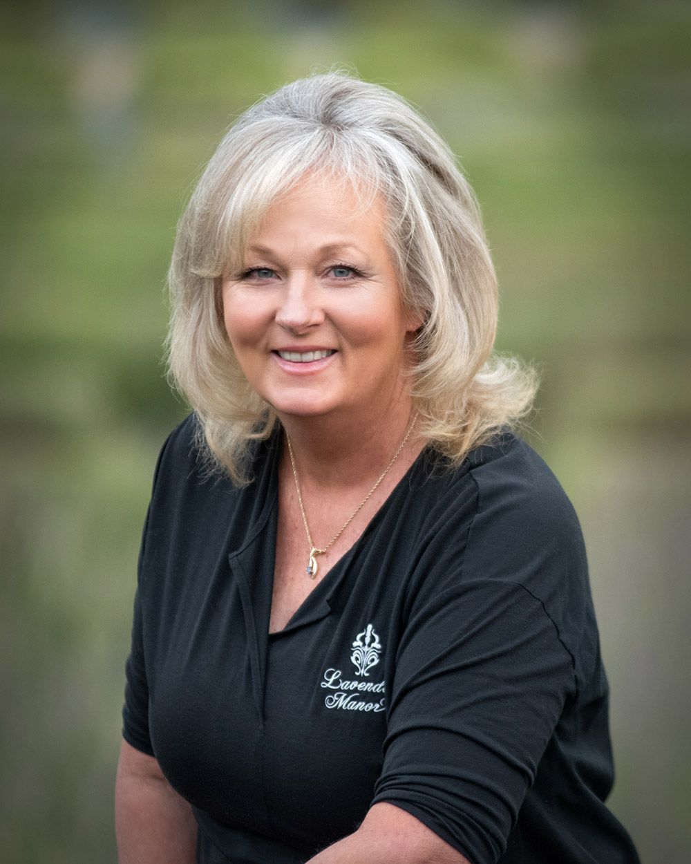 environmental corporate portraits of Spokane company owner woman by professional photographer Luba Wold in Post Falls